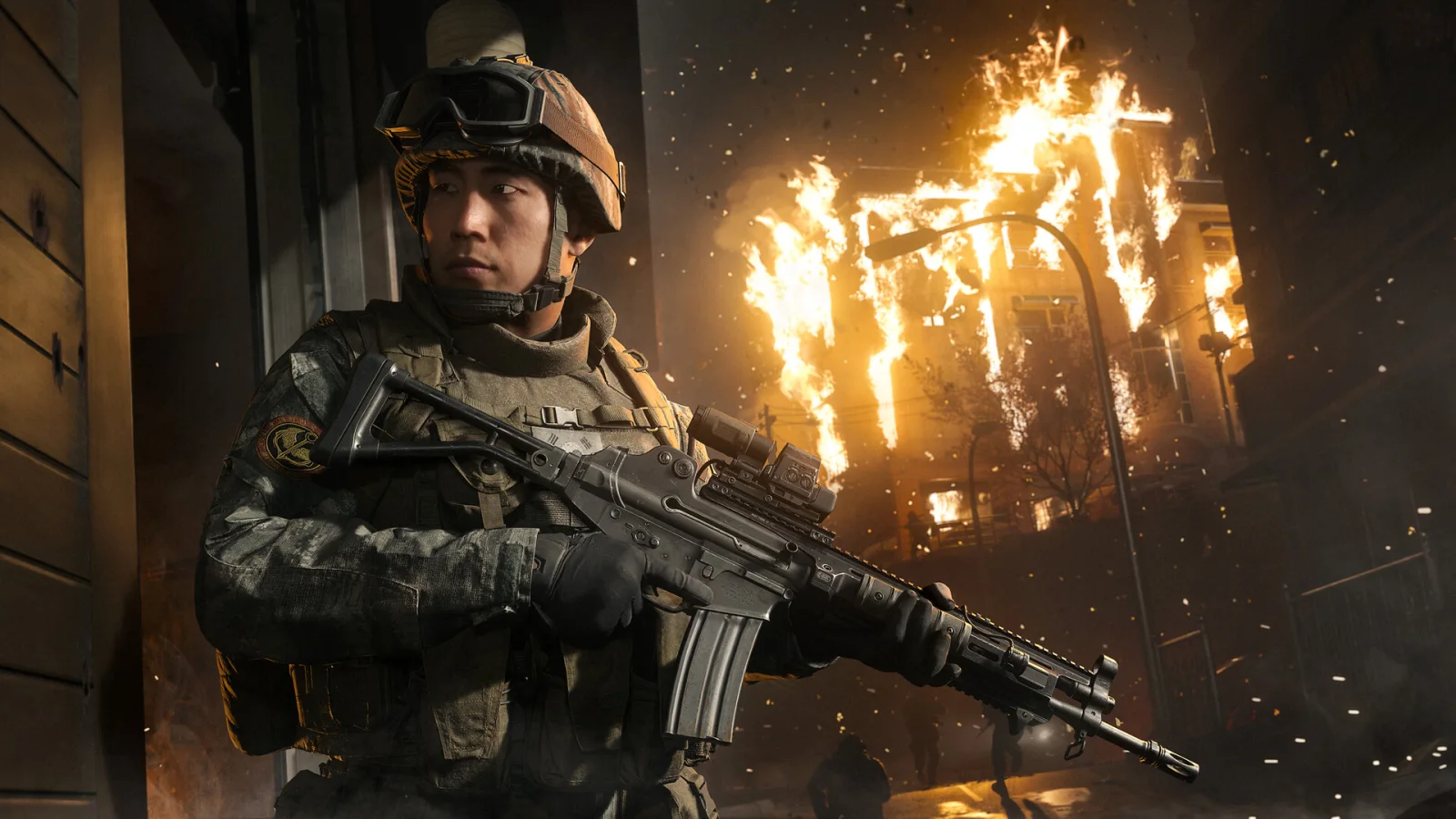 Un soldado armado frente a un edificio en llamas en Call of Duty: Modern Warfare 4